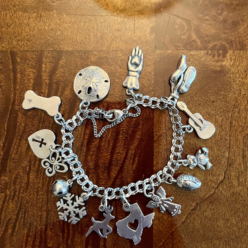 James Avery bracelet with 14 charms, 5 retired